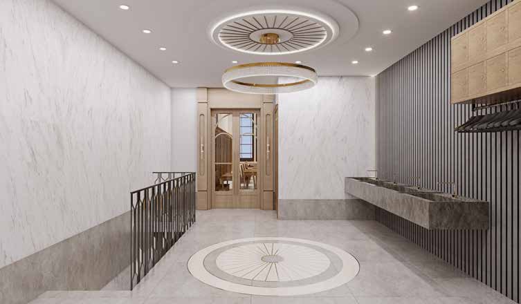 Marble entrance corridor with a sink for netilas yadayim and doors to the beis medrash